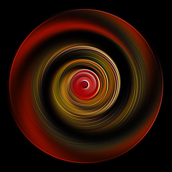 A swirling circular pattern with red, yellow, and black colors on a black background.